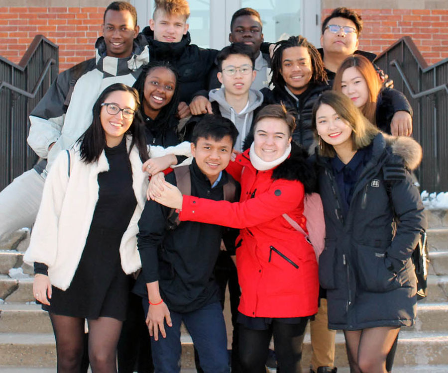 JPA student Sokhoeun ’19 with International students at Perkiomen School, in Pennsburgh, Pennsylvania, USA. Jay Pritzker Academy, Siem Reap, Cambodia. Jay-Pritzker-Academy-Siem-Reap-Cambodia